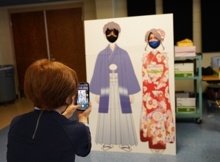 RCMS Students pose with Kimono Cut-out