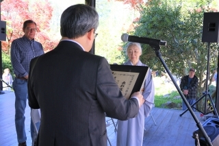 CG Maeda giving commendation